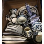 A box containing assorted blue and white china to include 19th Century saucer,