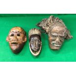 Three African masks to include a Chokwe style mask with fibre hair,
