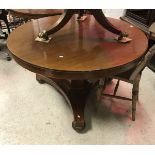 A Victorian mahogany circular breakfast table