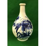 A 19th Century Japanese Imari yaki vase with blue floral decoration on a white ground