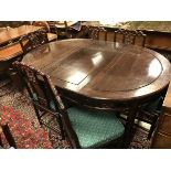 A modern suite of Chinese hardwood furniture comprising D end dining table, eight chairs,