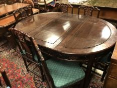 A modern suite of Chinese hardwood furniture comprising D end dining table, eight chairs,