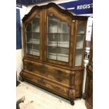 A 19th Century Dutch marquetry inlaid display cabinet the upper section with moulded cornice over