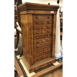 A Victorian walnut and satinwood strung ten drawer miniature Wellington chest