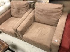 A pair of modern brown suede effect upholstered armchairs by Industrie Natuzzi