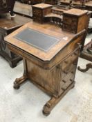 A Victorian walnut Davenport desk with four drawer superstructure over a sloping writing surface