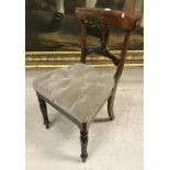 A set of six early Victorian mahogany bar back dining chairs with drop in buttoned seats raised on