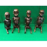 A collection of four African tribal articulated doll figures Nyamwezi Tanzania