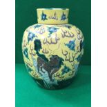 A 19th Century Chinese yellow ground vase and cover decorated throughout with various kylin amongst