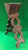 An early 20th Century Persian carved hardwood Quran stand