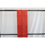 A circa 1970 silk summer Nagoya obi with Asa No Ha (Hemp leaf) decoration on a red ground