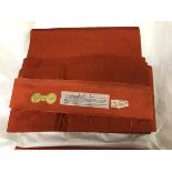 A circa 1970 silk Nagoya obi with Muji (plain) orange ground,