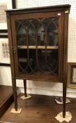 An Edwardian mahogany and inlaid single door display cabinet,