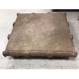 An 18th Century Indian carved stone plinth of square form,