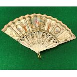 A 19th Century French fan with carved and painted ivory sticks,