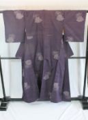 A circa 1940 Tsumugi silk semi-formal kimono with Botan (Peony) pattern on a purple ground