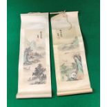 Two 20th Century Chinese school hand painted silk scrolls each depicting landscapes with script