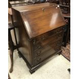 A mahogany bureau,