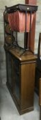 A late Victorian mahogany two door glazed display case,