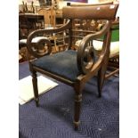 A set of five Regency mahogany bar back dining chairs with drop in seats on turned and octagonal
