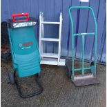 A Bosch AXT Rapid 2000 electric garden shredder together with a folding ladder and sack barrow