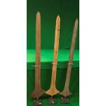 A collection of three patinated iron ceremonial Topoke currency spears,