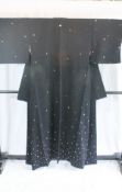 A circa 1970 Muji Komon silk kimono with Botan Yuki (Snow flake) design on a black ground