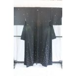 A circa 1970 Muji Komon silk kimono with Botan Yuki (Snow flake) design on a black ground