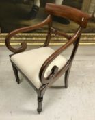A set of eight (6 + 2) Victorian mahogany bar back dining chairs with drop in seats on turned and