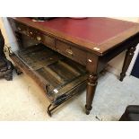 A Victorian mahogany writing table with red insert,
