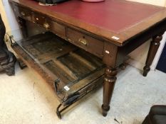 A Victorian mahogany writing table with red insert,