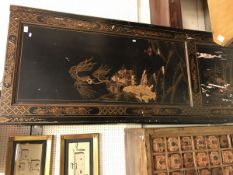 A late Victorian black lacquered and chinoiserie decorated wardrobe cupboard with single door