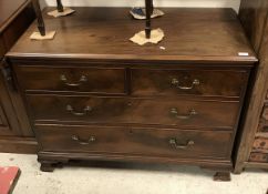 A circa 1900 mahogany chest of two short over two long drawers on ogee bracket feet