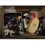 A box of assorted sundry items to include a collection of Robinson's Gollies,