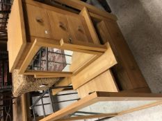 A light oak three drawer bedside chest, swing dressing mirror, square occasional table, tv stand,