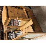 A light oak three drawer bedside chest, swing dressing mirror, square occasional table, tv stand,