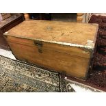 A 19th Century camphor wood trunk with brass corners and embellishments