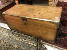 A 19th Century camphor wood trunk with brass corners and embellishments