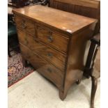 A 19th Century mahogany chest of two short over two long drawers raised on bracket feet