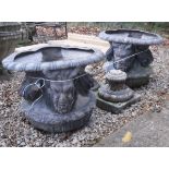 A pair of 18th Century (possibly earlier) lead garden urns with satyric mask and floral drape