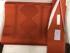 A circa 1970 silk Nagoya obi with Hishigata (geometric) orange decoration,