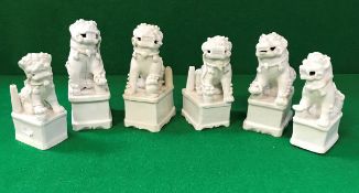 A collection of six 19th Century Chinese blanc-de-chine figures of temple lions,