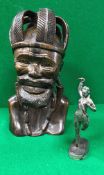 An African carved hardwood figure of a bearded tribal chieftain in leaf decorated crown by Alex