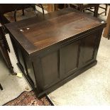 A 19th Century mahogany rounded rectangular drop leaf dining table and a 20th Century walnut coffer,