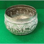 A Tibetan silver or white metal bowl embossed with symbols of the Zodiac bearing engraved mark to