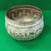 A Tibetan silver or white metal bowl embossed with symbols of the Zodiac bearing engraved mark to