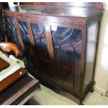 A mahogany bow fronted glazed display cabinet,