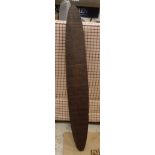 A late 19th/early 20th Century Aboriginal carved wooden parrying shield with all over carved