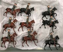 A box containing twelve Britains Household Cavalry Lifeguards with sabres and nine Army cavalry