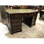 A 19th Century mahogany serpentine fronted kneehole desk,